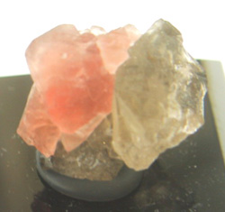 pink fluorite on smoky quartz