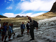 Mr.David Casteel is leading the hikers onto Grinnel Glacier
